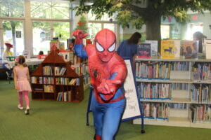 Spider-man throwing a web right at the camera